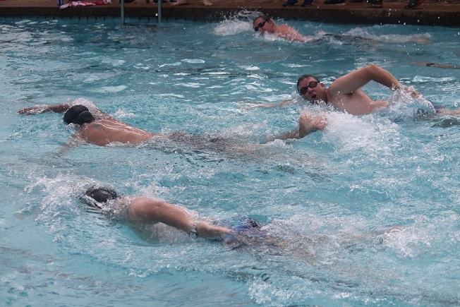 Adults swimming